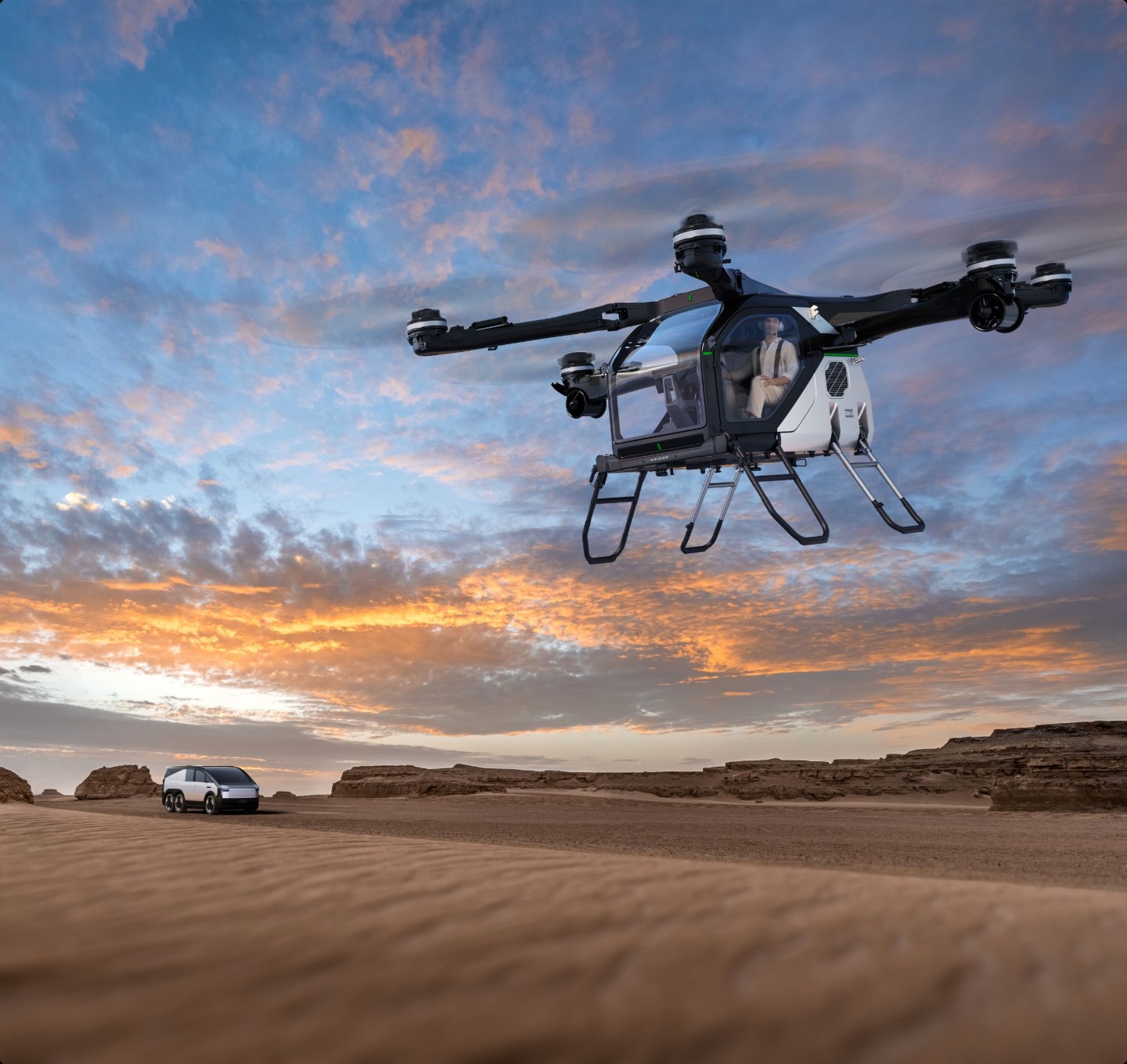 Летающий модуль ARIDGE и наземный автомобиль на закате